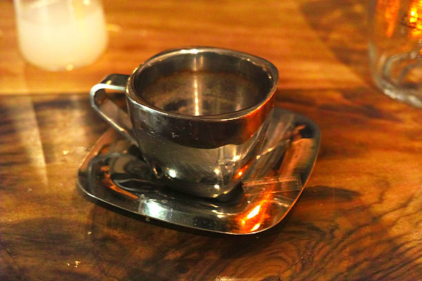 istock Metal Coffee Cup With Wood Background 488840602