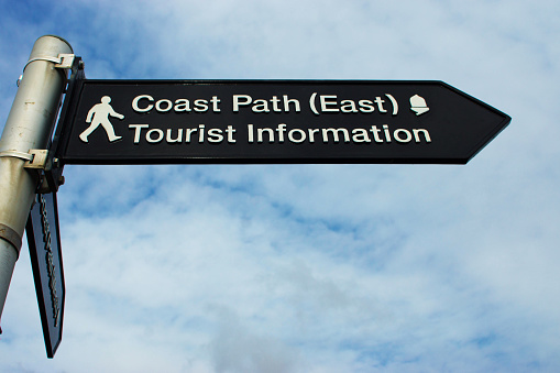 Lyme Regis, United Kingdom - February 20, 2015: Coast path sign near Lyme Regis, Dorset on the Jurassic Coast.