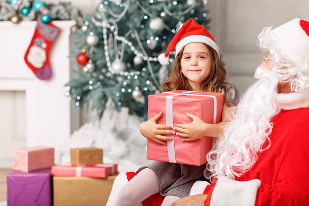 istock Pretty girl sitting with Santa 488848540