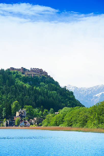 Landskron castle and lake Landskron castle and Ossiacher lake in Austria villach stock pictures, royalty-free photos & images
