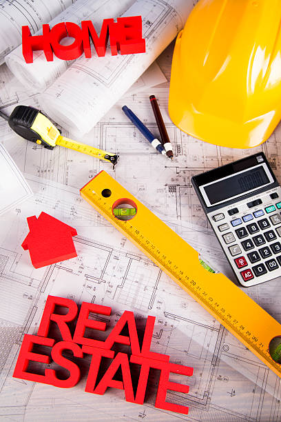 istock Real estate agency concept and blueprints 488848786