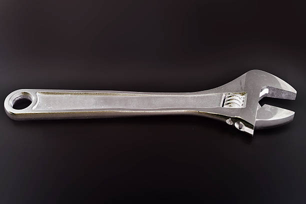 istock Screw Wrench Isolated On Black Background 488848908
