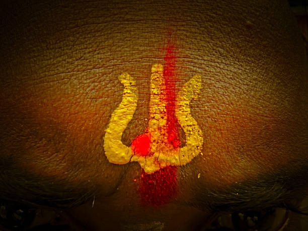 A holy sign called Trishul on man’s forehead