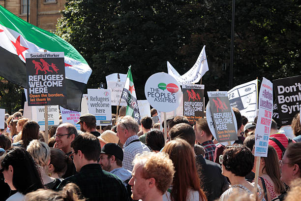 La solidarité envers les réfugiés mars - Photo