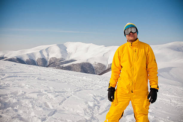 istock snowboarder against sun and sky 488850371