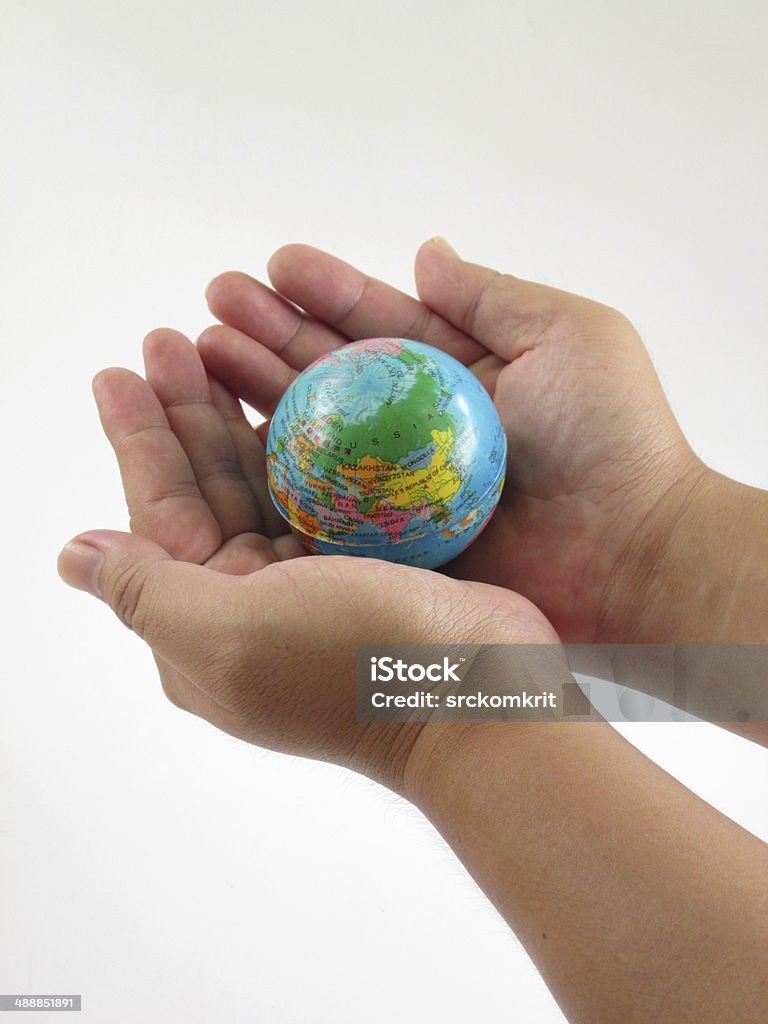 Globe ,earth in human hand Blue Stock Photo