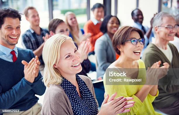 Group Of Multiethnic Cheerful People Applauding Stock Photo - Download Image Now - Meeting, Audience, Presentation - Speech