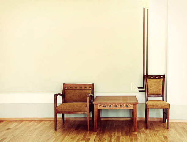 istock Two chairs and table near the wall 488856131