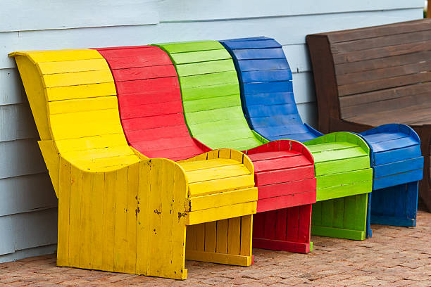 istock colorful wooden chairs 488856167