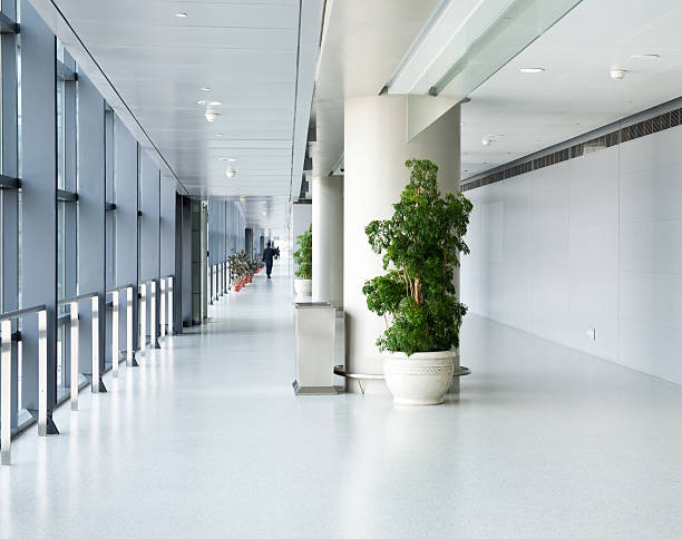leere korridor - airport entrance hall corridor lobby stock-fotos und bilder