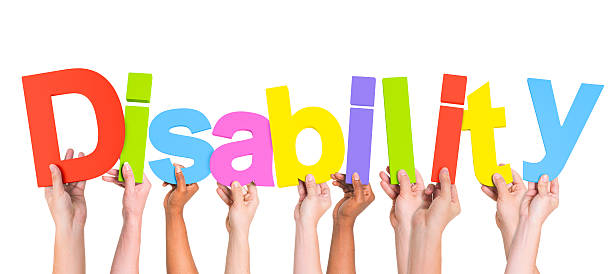 istock Group of Multiethnic Hands Holding Disability 488869097