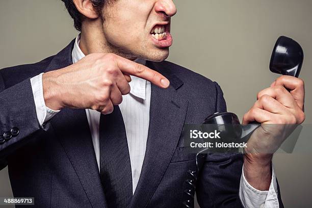 Angry Businessman On The Phone Stock Photo - Download Image Now - Frustration, Adult, Anger