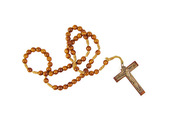 istock Wooden rosary with cross isolasted on a white background 488870124