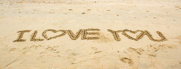 istock i love you text on sand 488870706