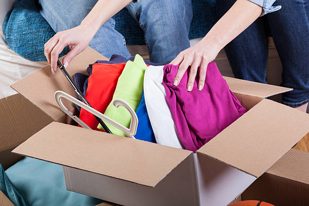 istock Family packing clothes 488870725