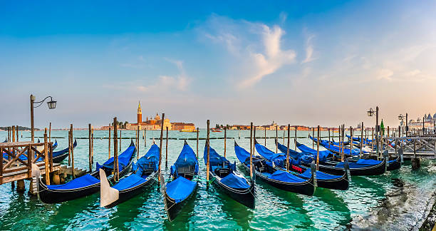 istock Gondolas on Canal Grande at sunset, San Marco, Venice, Italy 488872136