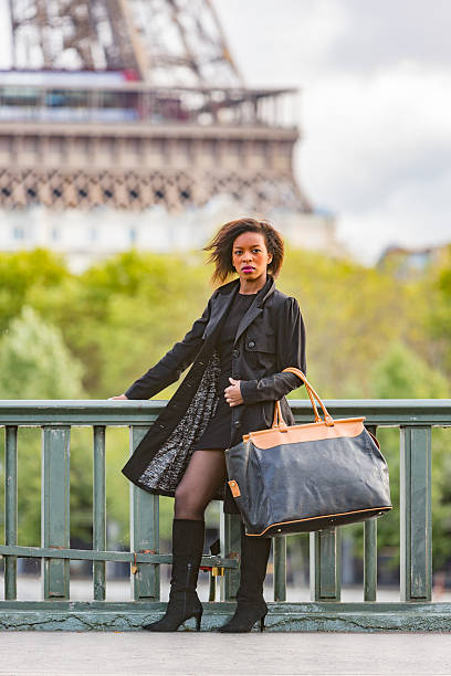 istock Stylish Young African Woman Walking By The Eiffel Tower 488872212