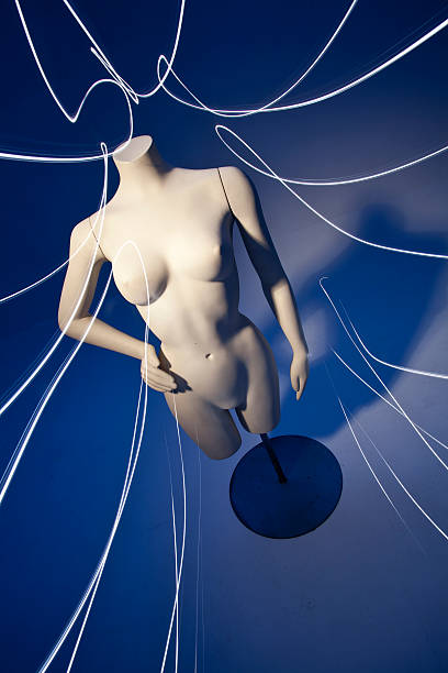 istock Female naked mannequin with hand on hip 488874321