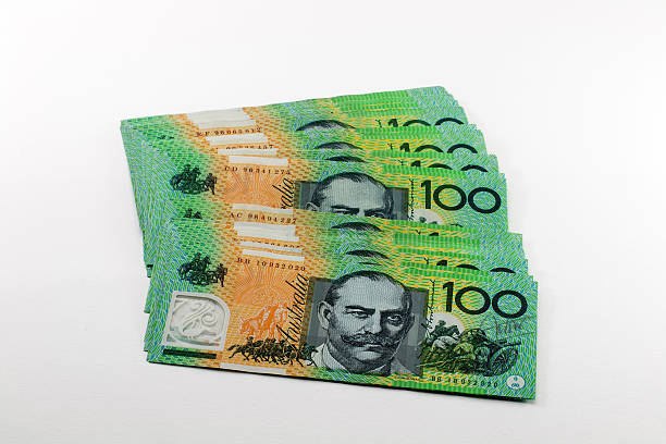 istock Money Australian hundred dollar bills isolate on white 488874738