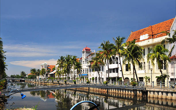 Jakarta old city, Indonesia Jakarta, Java, Indonesia: the old city - Dutch colonial buildings along the Kali Besar canal, commercial heart of the old Batavia - photo by M.Torres jakarta stock pictures, royalty-free photos & images