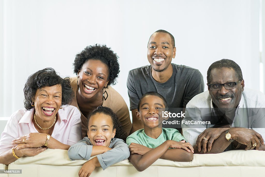 Multi-Generational Family Three generations of family together at home. 30-39 Years Stock Photo