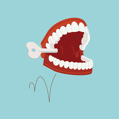 Vector illustration on jumping chattering teeth practical joke item