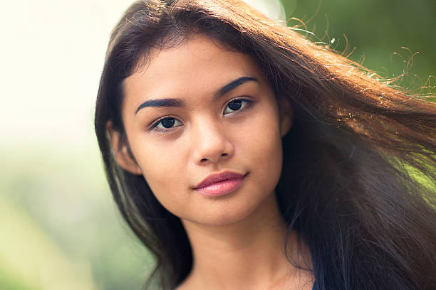 istock Young woman with wind in her hair 488875732