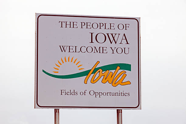 Welcome to Iowa sign Welcome to Iowa sign seen against the clouds. Iowa, USA. hello stock pictures, royalty-free photos & images