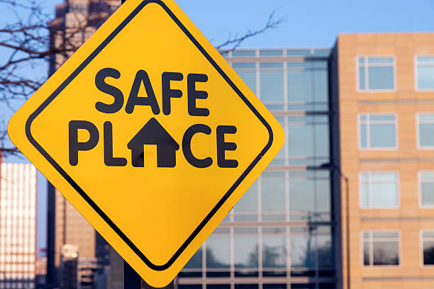 Safe place sign Safe place sign. Seen in downtown of Des Moines, Iowa, USA. arranging stock pictures, royalty-free photos & images