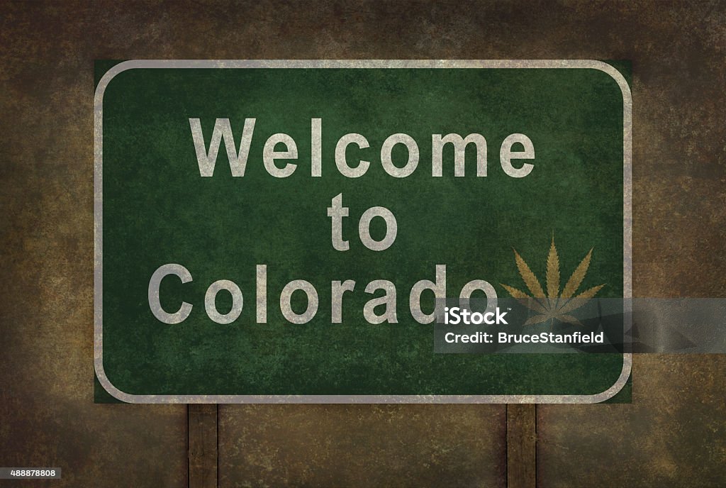 Welcome to Colorado (with marijuana leaf symbol) roadside sign Welcome to Colorado (with cannabis leaf symbol) road sign illustration, with distressed foreboding background Cannabis Plant Stock Photo