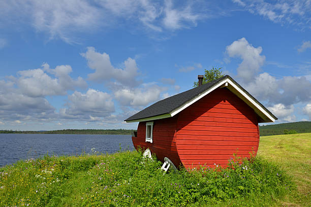 istock Finnish sauna on shore of blue lake 488878964