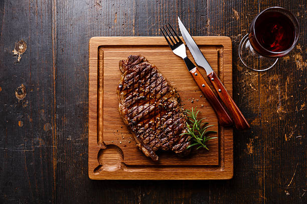 istock Grilled Steak Striploin and red wine 488879662