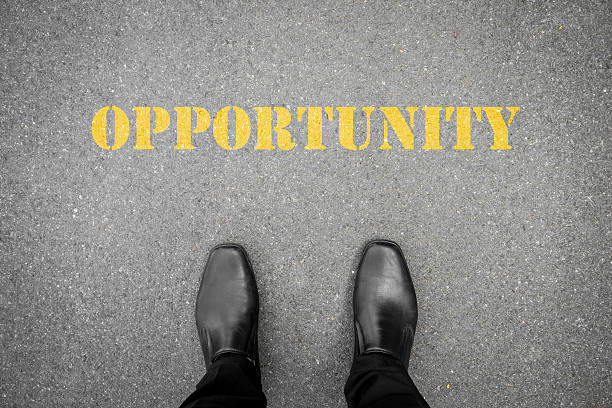 istock Black shoes standing in front of opportunity 488879912