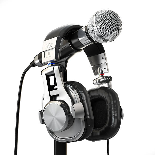 istock Microphone and headphones isolated on white. Audio recording con 488881858