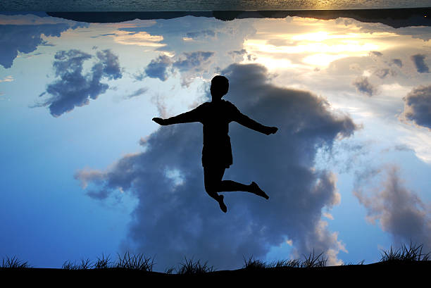 istock Freedom and Enjoyment concept - Happy lady jumping ,dancing with 488885314