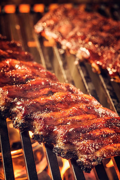 istock Marinated BBQ Pork Ribs on Barbecue Grill 488887893