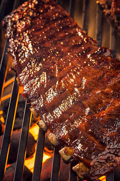 istock Marinated BBQ Pork Ribs on Barbecue Grill 488887897