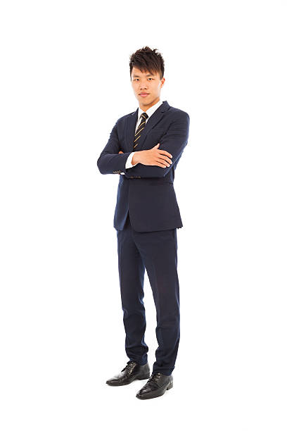 istock Confident businessman standing and  crossed arms 488888635