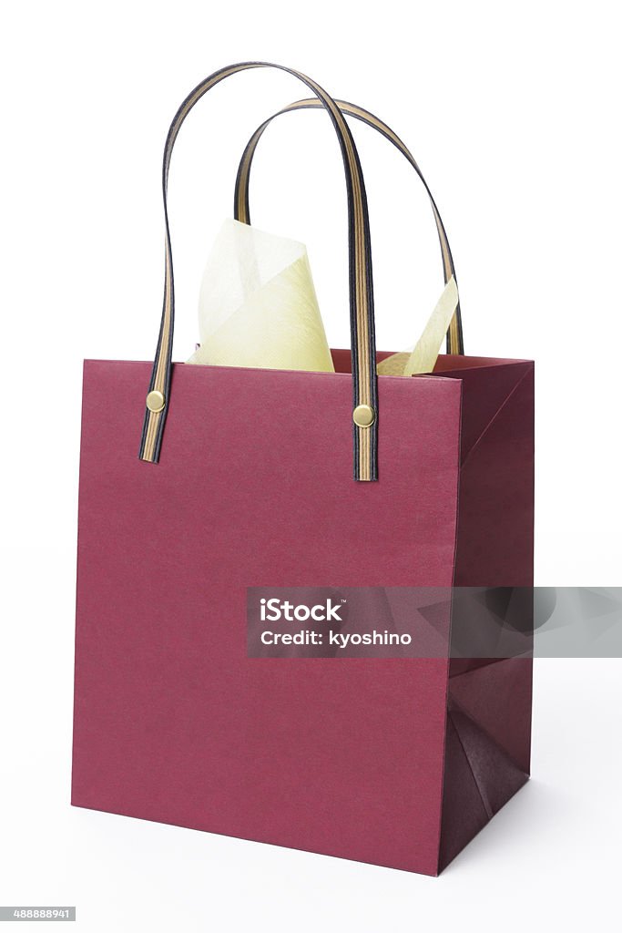 Isolated shot of decorated maroon shopping bag on white background Decorated maroon shopping bag isolated on white background with clipping path. Bag Stock Photo