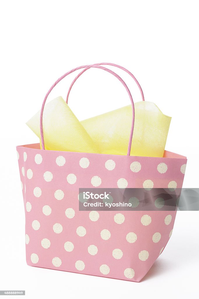 小さなピンク装飾を施した白い背景の上のショッピングバッグ - カットアウトのロイヤリティフリーストックフォト