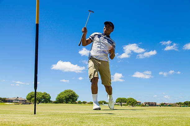 istock African golfer celebrating sinking his putt! 488890087