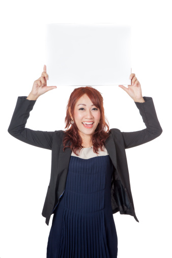 Asian office girl hold a blank sign with both hand over her head isolated on whtie backgound