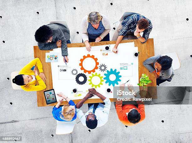 Group Of Business People Meeting Teamwork Stock Photo - Download Image Now - Gear - Mechanism, Learning, Organized Group