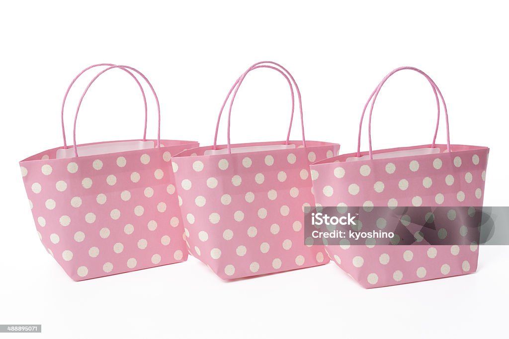 絶縁ショット 3 つのピンクの白い背景の上のショッピングバッグ - からっぽのロイヤリティフリーストックフォト
