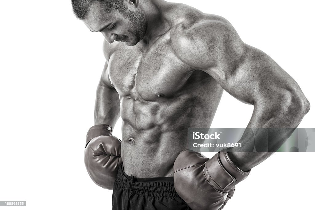 Boxer Muscular boxer standing in front of white background 20-24 Years Stock Photo