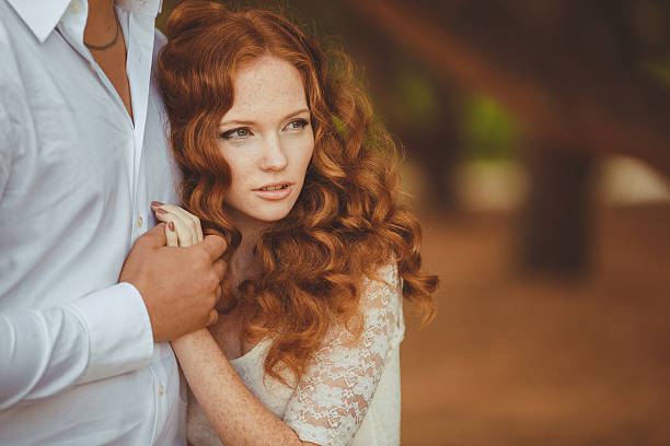 istock Loving couple in the summer park 488903820