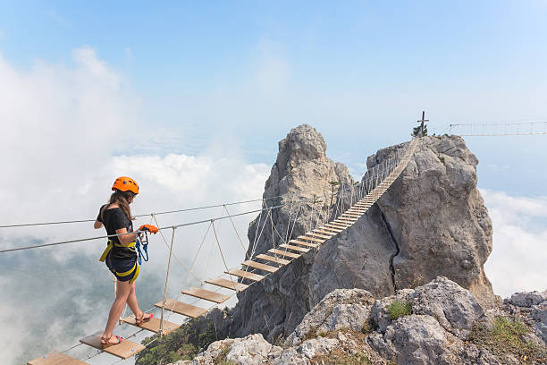 молодая девушка над белый - bridge crossing cloud built structure стоковые фото и изображения