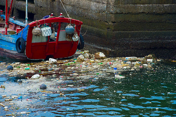 Plastic rubbish pollution in ocean. Photo showing pollution problem of garbage thrown directly into the sea with no proper trash collection or recycling.