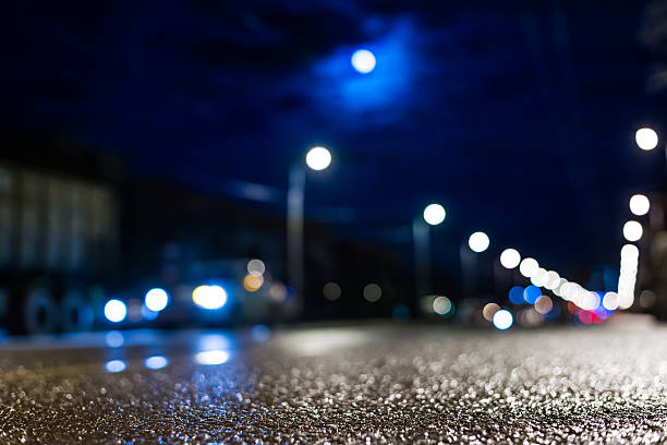 istock Night city after rain, the moon over the road 488908588