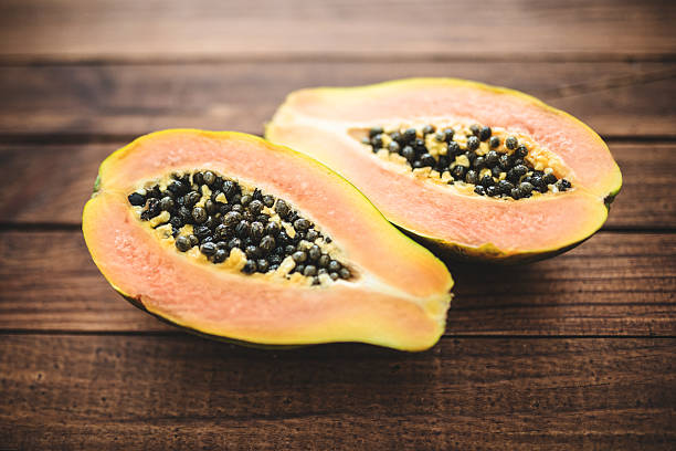 istock papaya on vintage plank wood 488909013